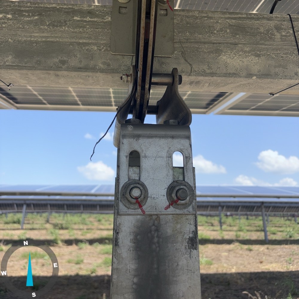 Torque-verified solar racking hardware under a clear sky